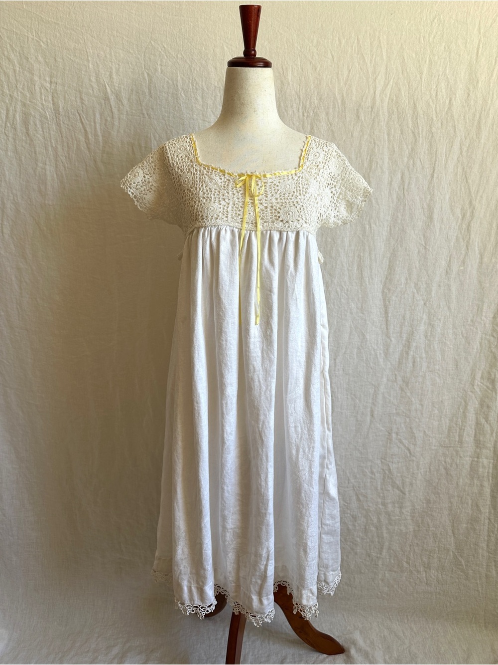 Handmade mini dress out of antique crochet yoke and jacquard linen bodice